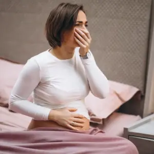 young-pregnant-woman-having-toxicosis-first-trimester-1024x683