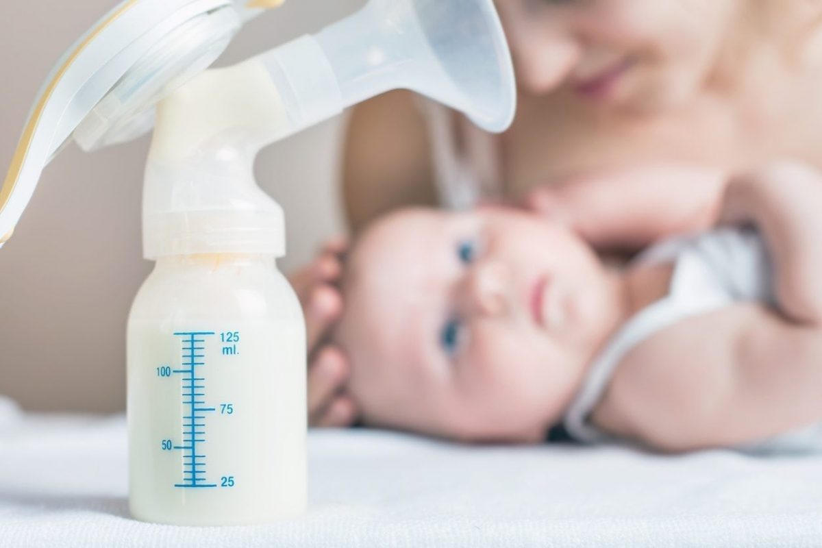 Manual-breast-pump-and-milk-at-background-481447636_1258x839